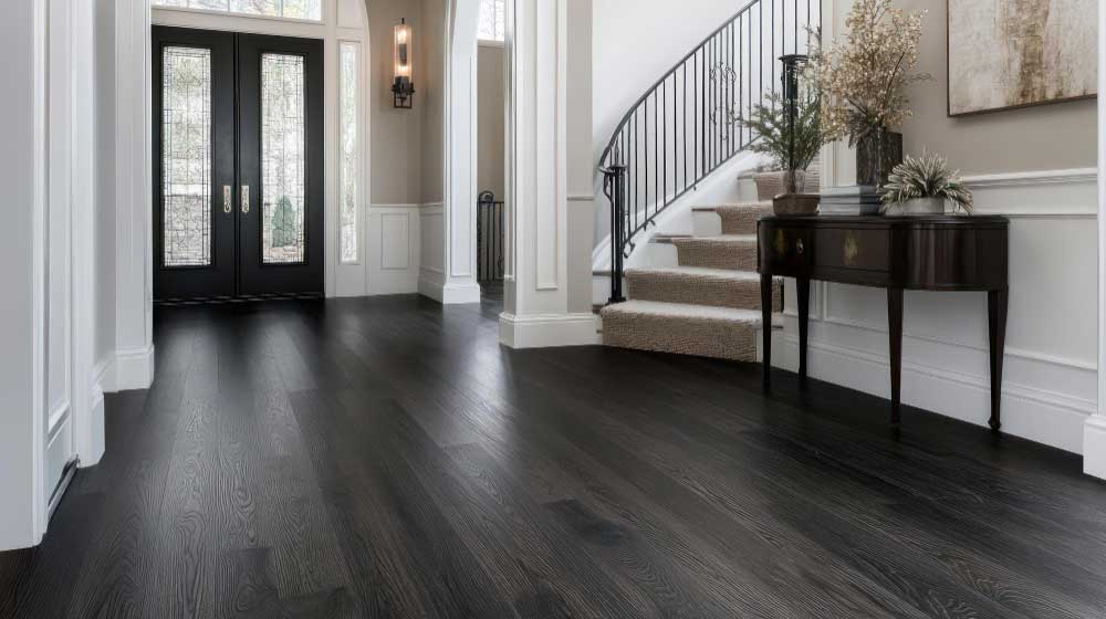 Timber-look flooring through an open-plan kitchen and living area